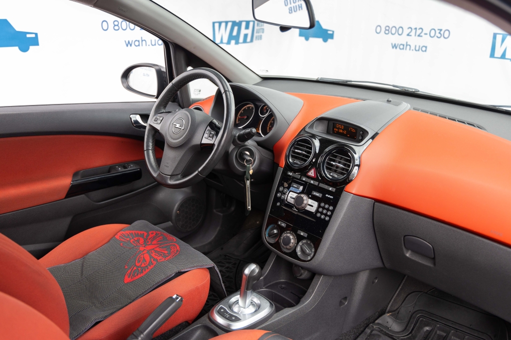 Opel Corsa 2010 фото 13