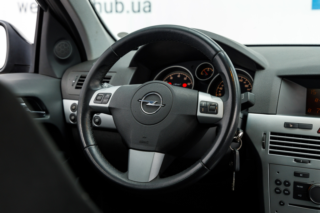 Opel Astra H 2010 фото 21