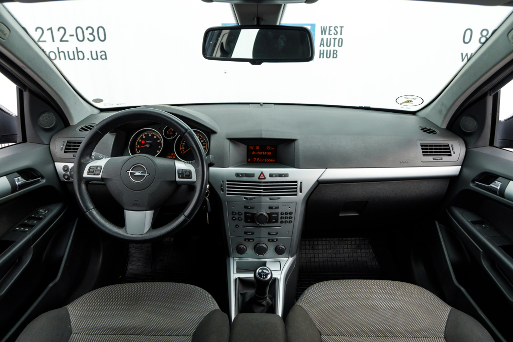 Opel Astra H 2010 фото 7