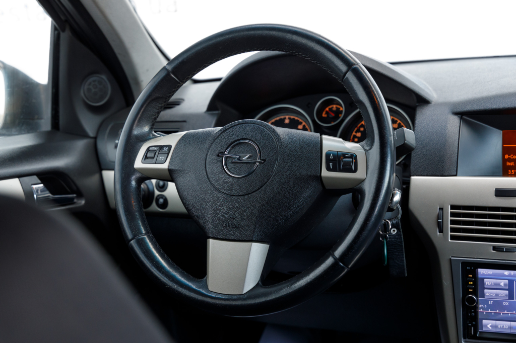 Opel Astra H фото 7