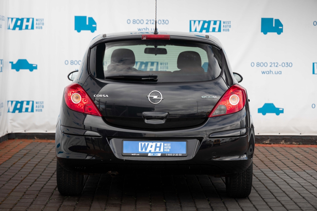 Opel Corsa 2010 фото 8